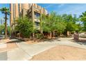 Beautiful building showcasing classic architectural details and lush greenery along the street at 387 N 2Nd Ave # F2, Phoenix, AZ 85003