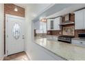 Modern kitchen featuring stainless steel appliances, granite countertops, and ample natural light at 4401 E Hubbell St # 57, Phoenix, AZ 85008