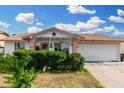 Charming single-story home with a well-maintained front yard and attached two-car garage at 4513 W Yucca St, Glendale, AZ 85304