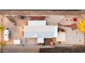 Aerial view of property showing the layout of the home, yard and parking at 466 N Rennick Dr, Apache Junction, AZ 85120