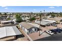 A panoramic aerial view shows the manufactured home's place within the community at 500 N 67Th Ave # 52, Phoenix, AZ 85043