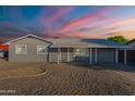 Inviting single-story home with a well-maintained xeriscaped front yard at 5801 W Cortez St, Glendale, AZ 85304