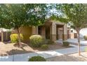 Beautiful single-story house with a well-kept yard and a cozy, covered entrance at 23195 S 226Th Way, Queen Creek, AZ 85142