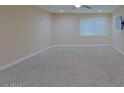 Spacious carpeted bedroom with a window at 4132 E Sweetwater Ave, Phoenix, AZ 85032