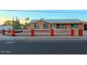 Street view of a well-maintained home with desert landscaping and a fenced yard at 4132 E Sweetwater Ave, Phoenix, AZ 85032