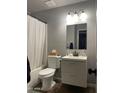Well-lit bathroom with a shower-tub combo and modern vanity offering practical space at 742 S Los Alamos --, Mesa, AZ 85204