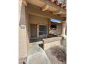 Inviting entrance with a covered porch, desert landscaping and well-maintained walkway at 97 N Cooper Rd # 97, Chandler, AZ 85225