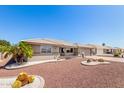 Lovely single-story home with desert landscaping and a charming front exterior at 11510 E Lomita Ave, Mesa, AZ 85209