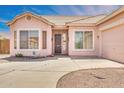 Charming single-story home with a well-maintained driveway and attached garage at 1633 E Jasmine St, Casa Grande, AZ 85122