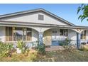 Cozy front porch with decorative plants, creating a warm and welcoming entrance at 1657 N 55Th Ave, Phoenix, AZ 85035