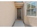 Inviting front entrance with a decorative door and a 'hello' welcome mat at 43507 W Cydnee Dr, Maricopa, AZ 85138