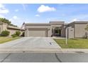 Charming single-story home features an attached garage, desert landscaping and an American flag at 7856 E Via Marina --, Scottsdale, AZ 85258