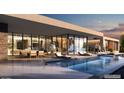 Stunning pool with lounge chairs and covered outdoor living area at 9828 E Running Deer Trl, Scottsdale, AZ 85262