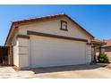 Attached two-car garage offering convenient parking and additional storage space at 1116 S 53Rd St, Mesa, AZ 85206