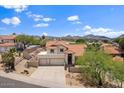 Charming home with desert landscaping, tile roof, a refreshing pool, and amazing mountain views at 1221 E Claire Dr, Phoenix, AZ 85022