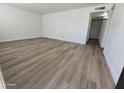 Bright living room featuring hardwood floors and neutral paint at 2544 N 52Nd Ave, Phoenix, AZ 85035
