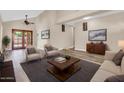 Open-concept living room featuring modern decor and seamless floor plan at 6837 S Roosevelt St, Tempe, AZ 85283