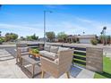 Inviting outdoor patio area with comfortable seating, perfect for enjoying the neighborhood views at 8430 E Fairmount Ave, Scottsdale, AZ 85251