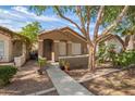 Attractive one-story house with front yard plants and desert landscaping at 875 S Nebraska St # 69, Chandler, AZ 85225