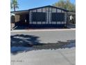 Charming manufactured home with two-car covered parking in well-maintained community at 9427 E University Dr # 48, Mesa, AZ 85207