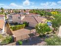 Aerial view of the property showing a patio, private yard and other neighborhood homes at 2111 E Azalea Dr, Chandler, AZ 85286