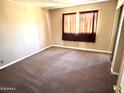 Bedroom with neutral walls and carpeted floor at 4065 E University Dr # 4, Mesa, AZ 85205