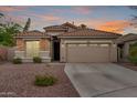 Charming single-story home with a well-maintained front yard and a neutral color palette at 4152 S Bandit Ct, Gilbert, AZ 85297