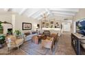 Bright living room with built-in cabinets, comfortable seating, and neutral tones creating a welcoming atmosphere at 7955 E Chaparral Rd # 73, Scottsdale, AZ 85250