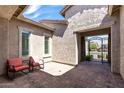 Inviting courtyard featuring stylish brick pavers and cozy seating at 18929 W Windsor Blvd, Litchfield Park, AZ 85340
