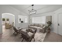 Bright living room featuring modern decor, stylish furniture, and plenty of natural light at 2152 E Casitas Del Rio Dr, Phoenix, AZ 85024