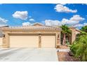 Charming single-Gathering home with a two-car garage, stone accents, and low-maintenance landscaping at 22351 N 67Th Dr, Glendale, AZ 85310