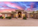 Stately single-story home featuring tiled roof and arched entryway at 3733 E Kachina Dr, Phoenix, AZ 85044