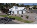 Stunning southwest home with desert landscaping, mature palms, and private courtyard at 9208 N 83Rd St, Scottsdale, AZ 85258
