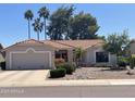 Charming home with tile roof and well-manicured desert landscaping at 9807 W Mcrae Way, Peoria, AZ 85382