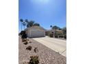 Charming home with tile roof and desert landscaping at 9807 W Mcrae Way, Peoria, AZ 85382