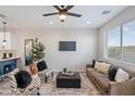 Cozy living room is bathed in natural light with a comfortable sofa and stylish decor at 1642 E Monte Vista Rd # 10, Phoenix, AZ 85006