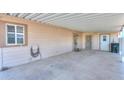 Covered carport providing ample parking with direct access to the home's entrance at 1855 N Rim Rock Dr, Casa Grande, AZ 85122