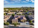Stunning single-story home with a tile roof in a vibrant community with mountain views at 21283 E Camacho Rd, Queen Creek, AZ 85142