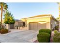 Beautiful single-story home featuring a spacious driveway and well-maintained landscaping at 23213 N Del Monte Dr, Sun City West, AZ 85375