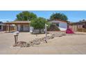 Charming single-story home featuring a well-kept desert landscaped front yard and inviting curb appeal at 4808 W Shaw Butte Dr, Glendale, AZ 85304