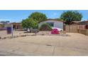 Charming single-story home with eye-catching curb appeal and tidy desert landscape at 4808 W Shaw Butte Dr, Glendale, AZ 85304
