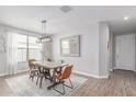 Bright dining room with stylish furnishings and natural light, perfect for Gathering gatherings at 681 W Belmont Red Trl, San Tan Valley, AZ 85143
