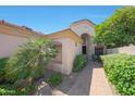 Stunning home showcasing a walkway with mature landscaping and a private entrance at 7705 E Doubletree Ranch Rd # 8, Scottsdale, AZ 85258
