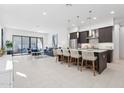 Open-concept kitchen with an eat-in island and stainless steel appliances at 1 Easy St # 15, Carefree, AZ 85377