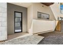Welcoming entryway showcasing a modern door, clean lines, and elegant stonework for a sophisticated appeal at 1 Easy St # 4, Carefree, AZ 85377