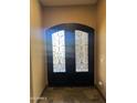 Elegant double front doors with decorative glass at 12937 W Calle De Sol --, Peoria, AZ 85383
