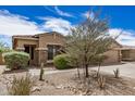 Beautiful single-Gathering home with a xeriscaped front yard and a welcoming entrance at 17773 W Manso St, Goodyear, AZ 85338