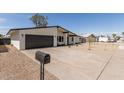 Well maintained single-story home featuring a low maintenance desert landscape and a two car garage at 3752 W Becker Ln, Phoenix, AZ 85029
