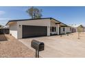 Well maintained single-story home featuring a low maintenance desert landscape and a two car garage at 3752 W Becker Ln, Phoenix, AZ 85029
