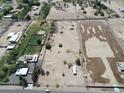 This aerial view shows the large 3.5 acre lot, bordered in red, ready for your new construction at 40458 N Prince Ave, San Tan Valley, AZ 85140